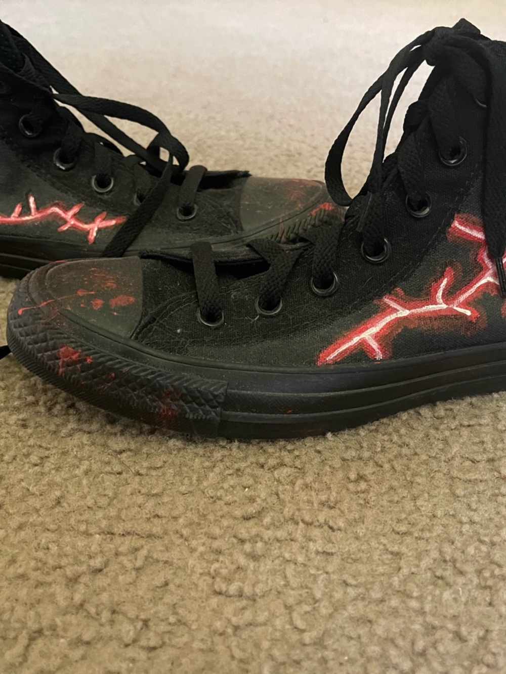 Converse Black High-Top Sneakers with Red Accent Stitching